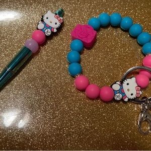 Hello Kitty pen and wristlet set